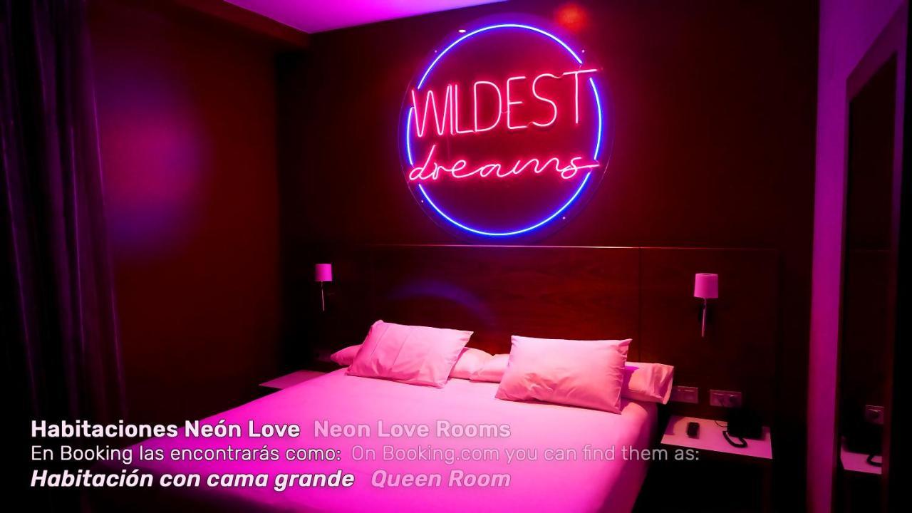 Spirit Hotel Gran Bilbao Bagian luar foto Neon Love Rooms