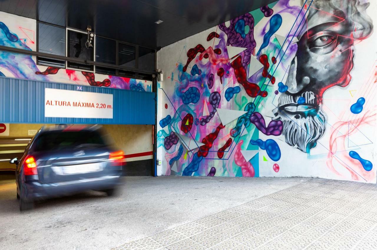 Spirit Hotel Gran Bilbao Bagian luar foto The entrance to the parking garage